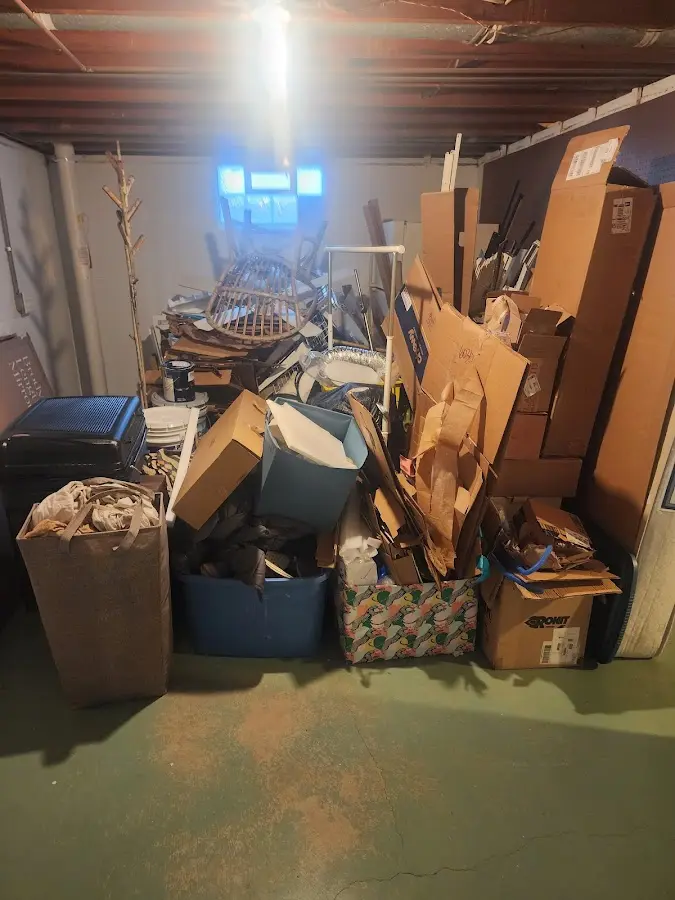 Roll-off dumpster container at job site for Yard Waste Dumpster Rental in Waterbury